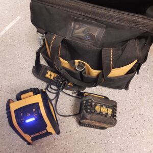 26-054- Bag containing 2 batteries, charger, speaker